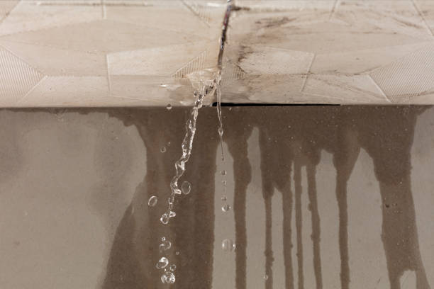 Professional Flood Damage Cleanup technician working in South Paris, ME